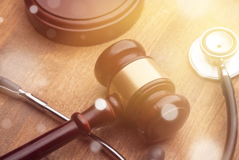 a gavel and a stethoscope, representing personal injury law.